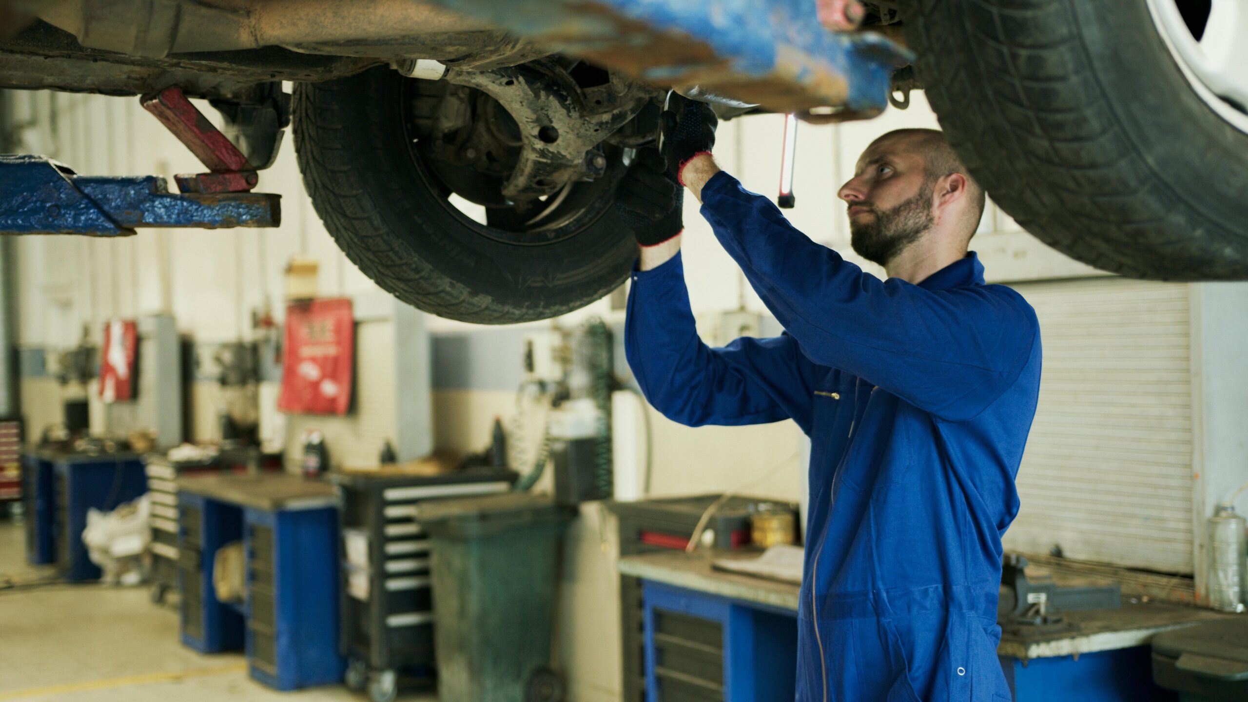 Photo of mechanic fixing a bakery's boiler system